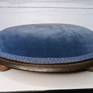 Vintage Blue Upholstered Velvet Footrest with Metal Flower Detail and Round Wooden Feet
