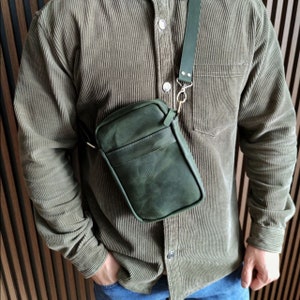 Genuine leather green messenger bag. Handmade shoulder bag with metal furniture. Thick durable leather