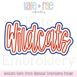 May include: An orange "Wildcats" applique design with a blue outline. The text is in a cursive font. The design is on a white background. The top of the image has the text "kate + rae embroidery" in pastel colors.