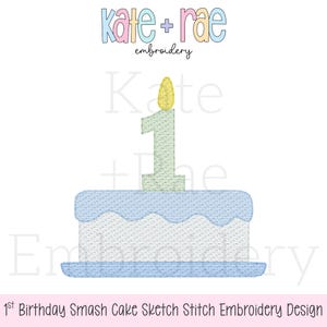 May include: An embroidered design of a birthday cake with a number one candle. The cake is light blue with white frosting and a blue base. The candle is green with a yellow flame. The text "Kate + Rae embroidery" is at the top.