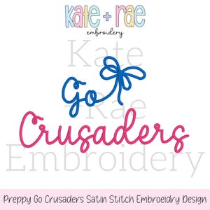 May include: Preppy Go Crusaders embroidery design with a blue ribbon and pink lettering.
