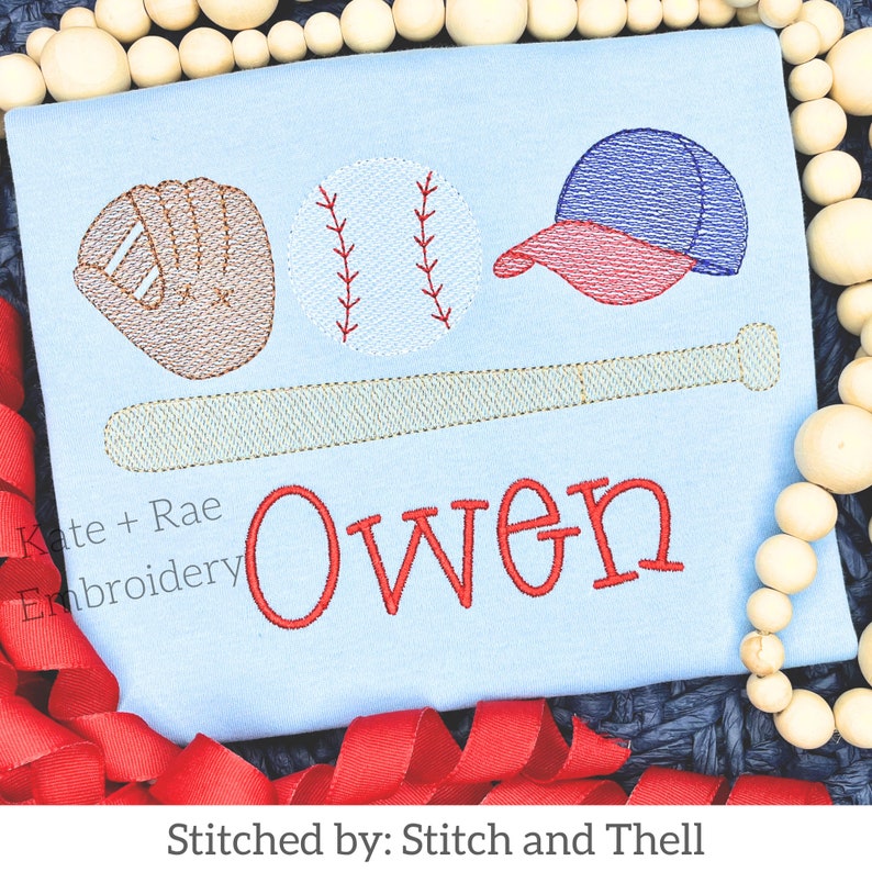 May include: A light blue baby onesie with embroidered baseball themed graphics, including a baseball, bat, glove, and cap. The name "Owen" is embroidered in red below the graphics.