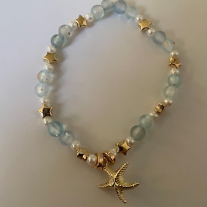Blue and gold pearl star bracelet