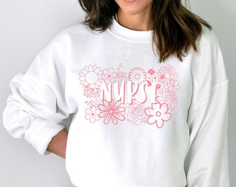 Pink Flowers Groovy Nurse Sweatshirt - Comfy Floral Pullover for Healthcare Professionals, Perfect Nurse Appreciation Gift