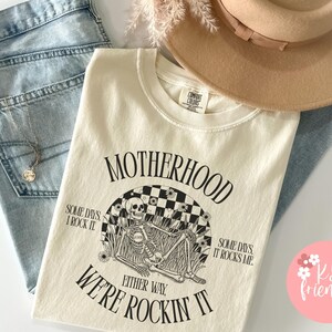 Motherhood graphic t-shirt, Comfort Colors, Motherhood Sometimes I Rock It Sometimes It Rocks Me Shirt, Mama Shirt, Mothers Day Gift