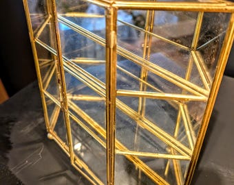 Vintage brass mirrored curio cabinet