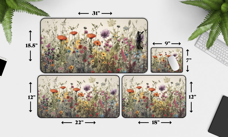 May include: A set of four mousepads featuring a watercolor-style illustration of a field of wildflowers in shades of pink, purple, yellow, and orange. The mousepads are available in three sizes: 9x7 inches, 18x12 inches, and 22x12 inches. The largest mousepad is 31x15.5 inches.