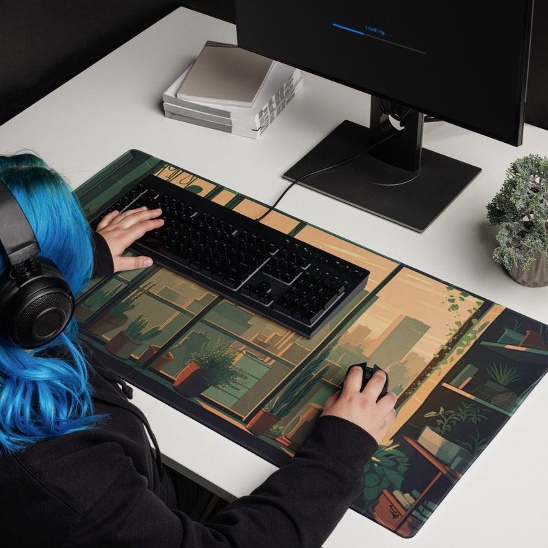 May include: A person using a black keyboard with a city skyline and plants design mousepad. The mousepad has a brown background with green and yellow accents.