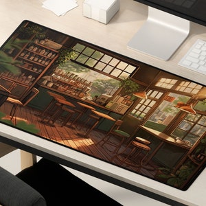 May include: A brown and green illustrated mousepad featuring a cafe interior with a counter, shelves, and tables. The cafe has large windows with a view of a city street. The mousepad has a white border.