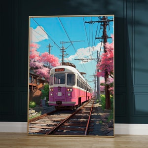 May include: A pink and white train with the Japanese text "新橋駅" on the front, traveling on a track through a lush green landscape with cherry blossom trees in bloom.