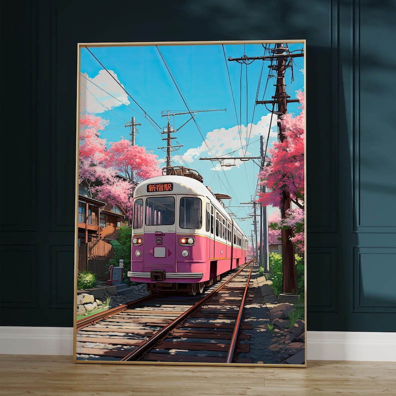 May include: A pink and white train with the Japanese text "新橋駅" on the front, traveling on a track through a lush green landscape with cherry blossom trees in bloom.