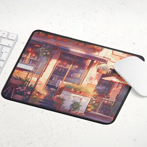 以下が含まれることがあります： 大きなショーウィンドウのある店のカラフルなイラスト。店は鉢植えの植物と花で飾られています。建物は黄色とオレンジの暖色系で塗られています。太陽が明るく輝き、歩道に長い影を落としています。