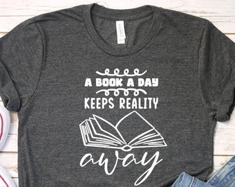 Book Lover Shirt: A Book A Day Keeps Reality Away