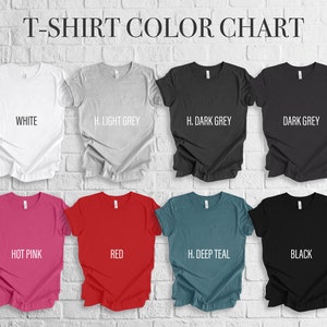 May include: T-shirt color chart featuring eight different shirt colors: white, light grey, dark grey, dark grey, hot pink, red, deep teal, and black. The text "T-SHIRT COLOR CHART" is at the top.