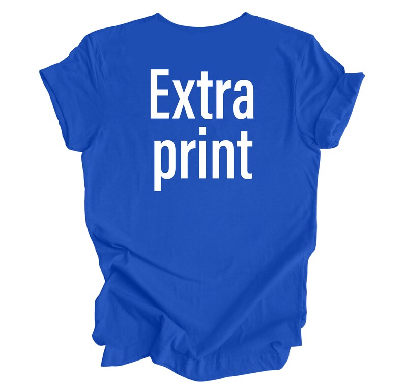 May include: A royal blue t-shirt with the text "Extra print" in white.