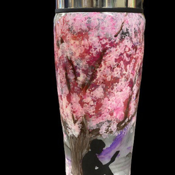 Hand painted Cherry Blossom tree with boy reading stainless steel tumbler.