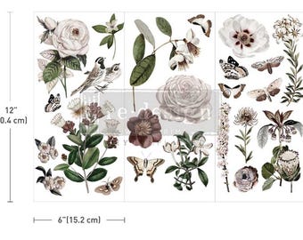 May include: A decorative transfer sheet featuring botanical illustrations. The design includes roses, butterflies, birds, and other floral elements in shades of white, brown, and green. The sheet measures 12 inches (30.4 cm) high and 6 inches (15.2 cm) wide.