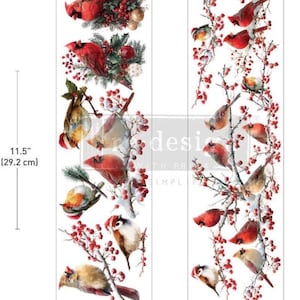 May include: Two vertical decorative transfer sheets featuring red cardinals and small birds perched on snowy branches with red berries. The sheets measure 11.5 inches by 3.25 inches and include various bird illustrations with winter foliage and red accents.