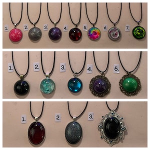 Resin Dome Pendants w/ either 18” black cord chain or 24” steel ball chain