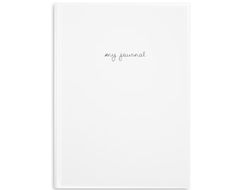 May include: A white journal with the words "my journal" written in black ink on the front cover.