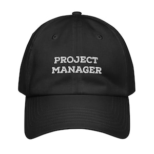 May include: Black baseball cap with white embroidered text that reads "PROJECT MANAGER".