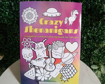 May include: A pink, yellow, and blue coloring book with the title "Crazy Shenanigans: a complete random coloring book for all ages". The cover features a variety of black and white illustrations, including a unicorn, a skull, a monster, a guitar, a watermelon, a flower, a UFO, a heart, a planet, and a Rubik's cube.