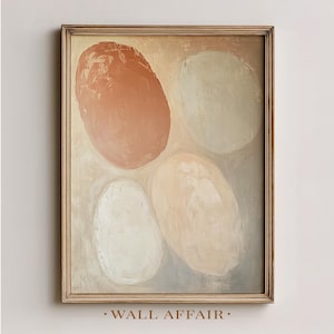 May include: Abstract art print in a wooden frame. The artwork features four large, oval shapes in shades of peach, cream, and white against a neutral background. The text "WALL AFFAIR" is at the bottom of the frame.