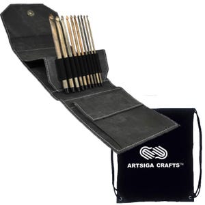 May include: A set of crochet hooks in a dark gray canvas case with white stitching. The case is open, revealing the hooks, and includes a black drawstring bag with the text "ARTSIGA CRAFTS™" in white.
