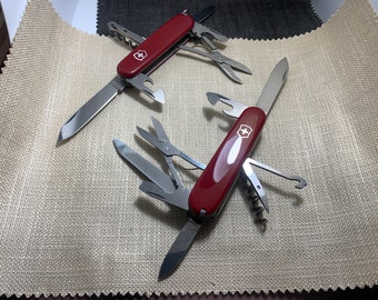 2 couteaux Victorinox Mountaineer 91 mm et Climber 91 mm