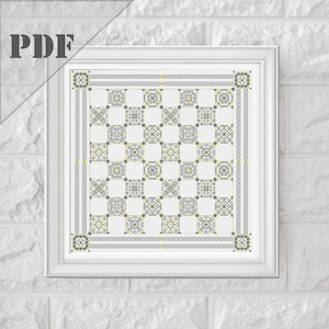 May include: A black and white cross-stitch pattern with a Celtic knot border. The pattern is in a white frame and features a checkered design with intricate details.