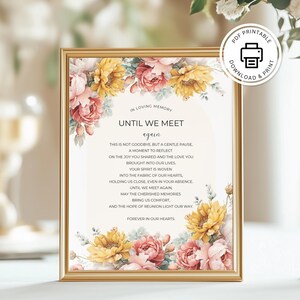 Puede incluir: Una impresión enmarcada con un borde dorado presenta arreglos florales en tonos de rosa, amarillo y melocotón. El texto dice "Until We Meet Again" con un poema debajo. Un icono imprimible en PDF está en la esquina superior derecha.
