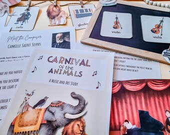 May include: A colorful educational poster for a music and art study of Carnival of the Animals. The poster features a cartoon elephant, lion, and a musical note. The text on the poster reads "Carnival of the Animals, A Music and Art Study".