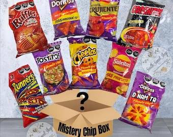 May include: A mystery chip box with a question mark on the top. The box is surrounded by various bags of chips, including Ruffles, Doritos, Tostitos, Cheetos, Sabritas, Runners, and a few others. The chips are all different flavors and brands.