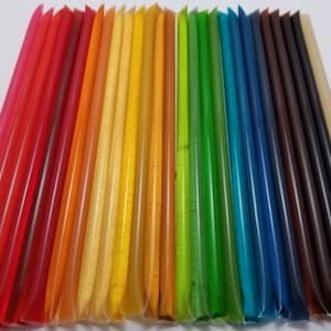 May include: A rainbow assortment of colorful, translucent, individually packaged, frozen juice pops.