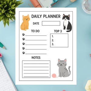 Peut inclure: Un agenda quotidien blanc sur le thème des chats. Il comprend des sections pour la date, les tâches, les 3 priorités principales et les notes. Décoré avec des chats de dessins animés et des empreintes de pattes.