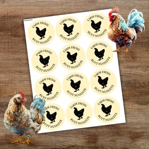 May include: Twelve round yellow stickers with black text and a black silhouette of a chicken. The text on the stickers reads 