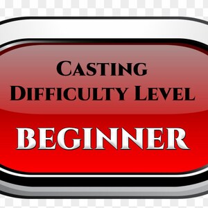 May include: A red oval button with a silver border and black trim. The button has white text that reads 'Casting Difficulty Level Beginner'.