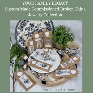 May include: A collection of custom-made jewelry pieces, including earrings, rings, and necklaces, crafted from broken china. The jewelry is displayed on a white plate and presented in small, brown cardboard packages. The text reads: "YOUR FAMILY LEGACY Custom Made Commissioned Broken China Jewelry Collection."