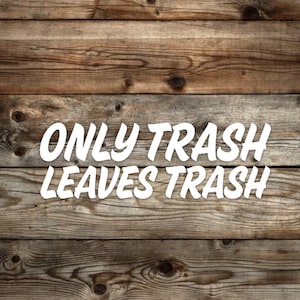May include: White text on a wooden background reads "Only trash leaves trash".