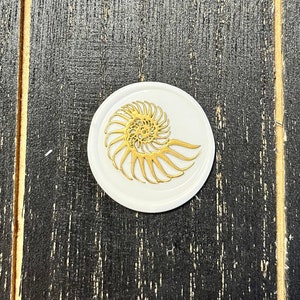 Nautilus shell, beach, ocean themed premade self adhesive wax seal sticker for weddings, invitations and announcements.