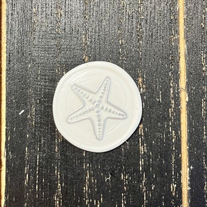 Starfish, beach, ocean themed premade self adhesive wax seal sticker for weddings, invitations and announcements.