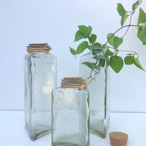 3 Vintage Triangular Green glass bottles or vases