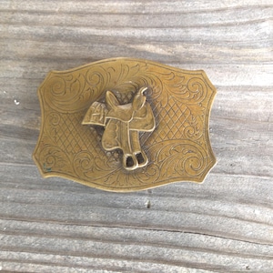 Vintage antique brass saddle belt buckle, detailed scrolling