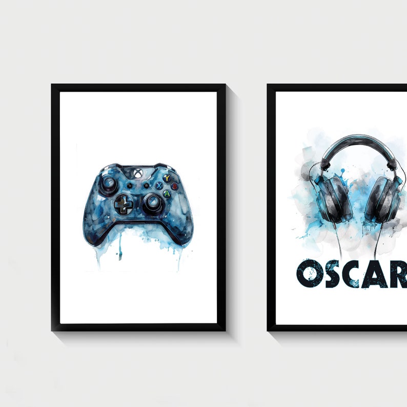 May include: Two framed prints, one with a blue watercolor illustration of a video game controller and the other with a blue watercolor illustration of headphones and the word "OSCAR" in black.