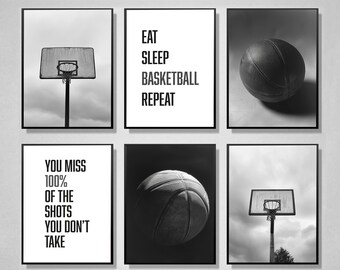 May include: Six framed black and white basketball-themed prints. The prints feature images of a basketball hoop, basketballs, and motivational text including "Eat Sleep Basketball Repeat" and "You Miss 100% of the Shots You Don't Take."