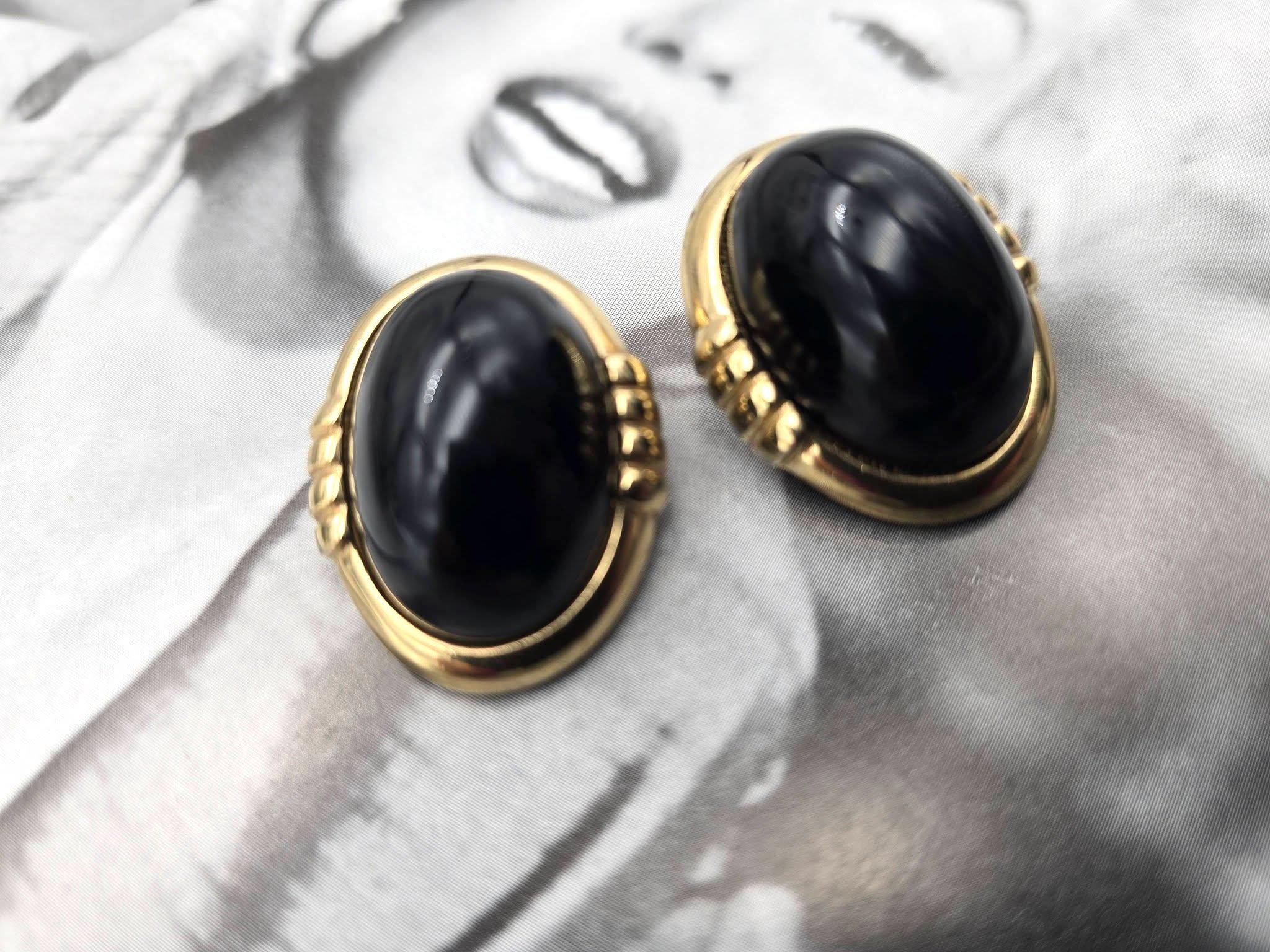 Vintage Donald Stannard Dynasty series black cabochon and gold tone frame clip on earrings, costume jewellery