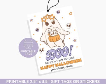 May include: A Halloween-themed gift tag featuring a cartoon ghost holding a pumpkin with a skull. The tag has the word "BOO!" and "Happy Halloween" text. The tag is 2.5" x 3.5" and has a black string attached.