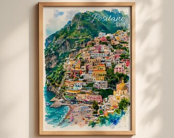 May include: A framed watercolor-style art print depicting the coastal town of Positano, Italy. The image features colorful buildings built into a steep green cliffside overlooking a blue sea and a sandy beach, with the text Positano Italia.