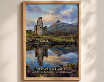 May include: A framed landscape painting of Ardvreck Castle on the shores of Loch Assynt in the Scottish Highlands. The artwork features stone ruins, purple heather, a mountain backdrop, and a reflective lake under a cloudy sky.