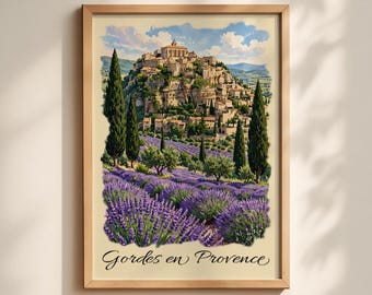 May include: A framed wall art print featuring a landscape illustration of the village of Gordes in Provence, France. The scene depicts a hilltop stone village surrounded by vibrant purple lavender fields, tall green cypress trees, and a blue sky. The text Gordes en Provence is printed in black cursive at the bottom.